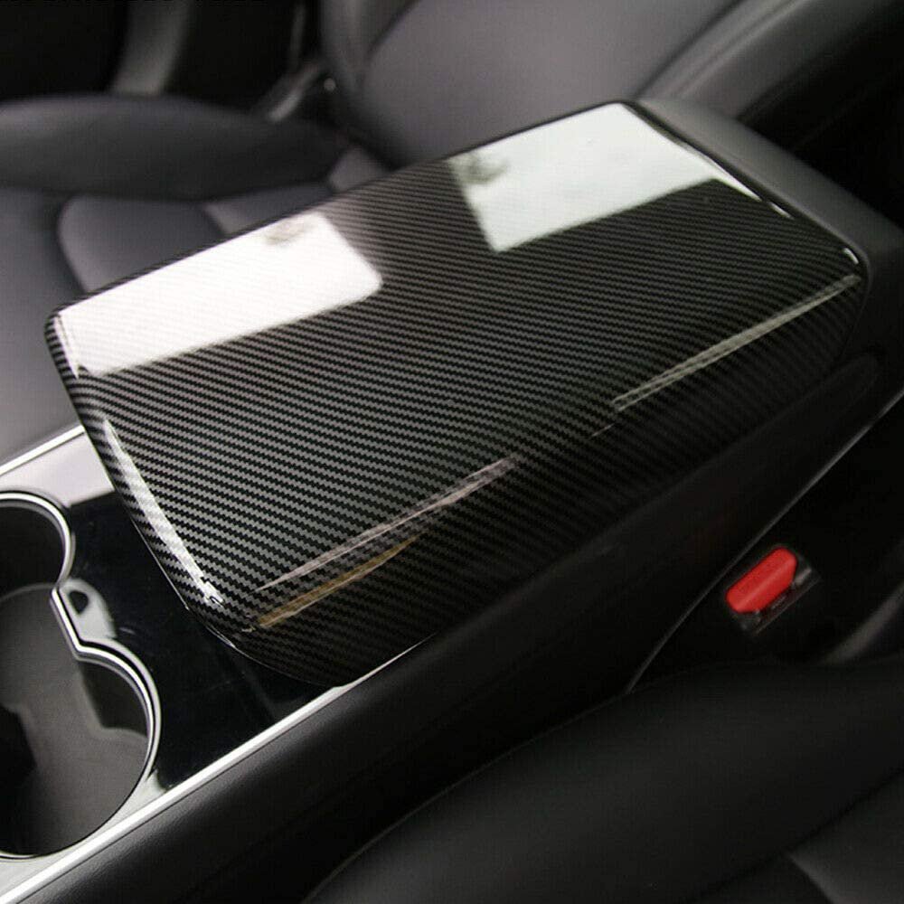 Tesla Model Y / 3 armrest cover in dry carbon fiber, interior modification by Tesery Official for a sleek, stylish look.