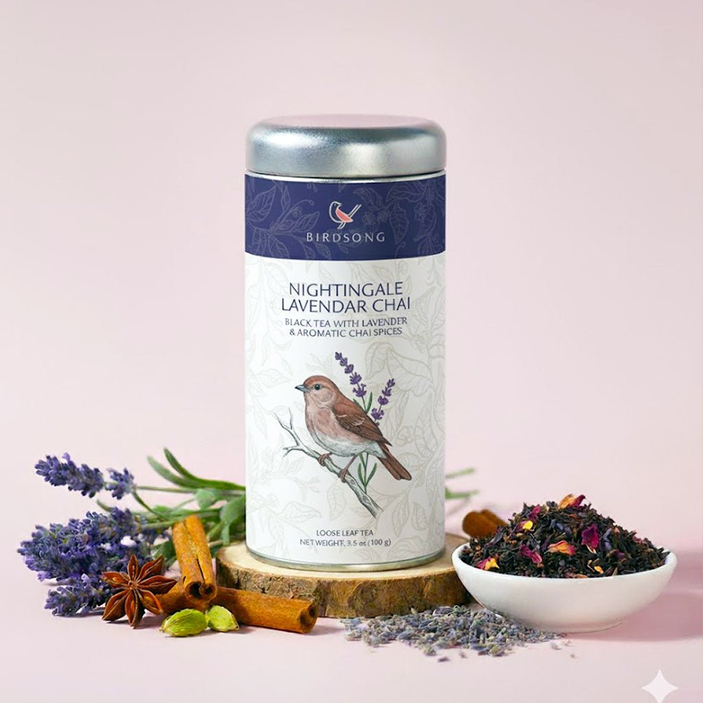 Brewed cup of Birdsong Tea Nightingale Lavender Chai with lavender and chai spices in a cozy setting.