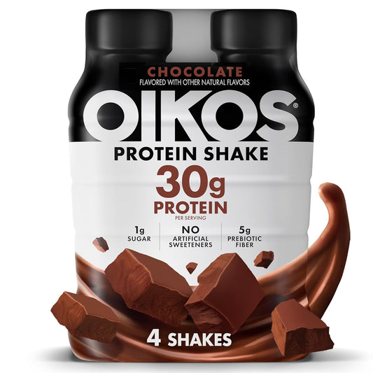 Four Oikos Chocolate Protein Shakes in 12 fl oz bottles, high protein, shelf-stable, ready-to-drink with 5g prebiotic fiber.