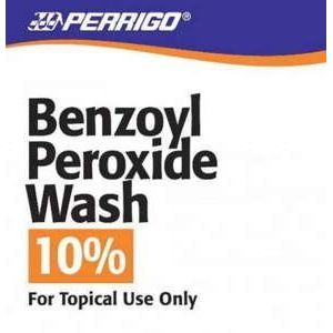 Benzoyl Peroxide 10% Acne Treatment Wash by Pasteur Pharmacy, with a clear bottle of facial cleanser against a white background.