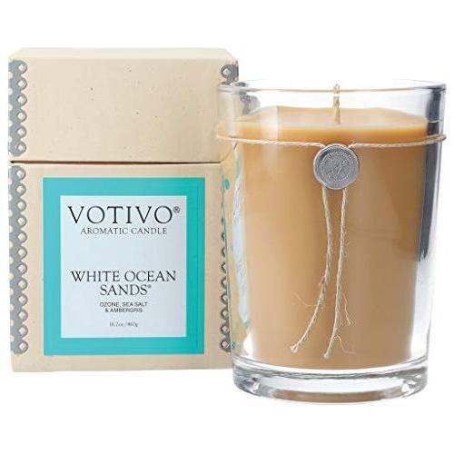 Votivo Aromatic Candle White Ocean Sands 6.8oz with a white ceramic holder, showcasing a serene, ocean-inspired design.