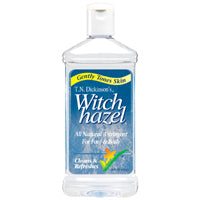T.N. Dickinson’s 100% natural witch hazel astringent bottle for face and body, 16 fl oz, with label showing product details.