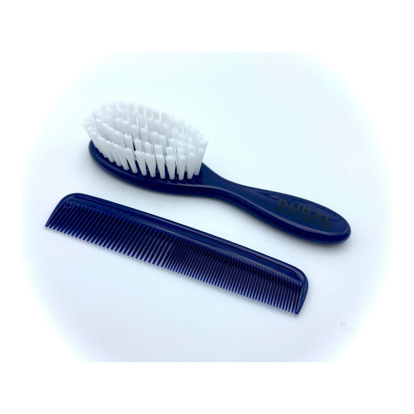 Blue Dural Baby Brush Set with 5 rows of plastic nylon bristles, designed for gentle baby hair and scalp care.