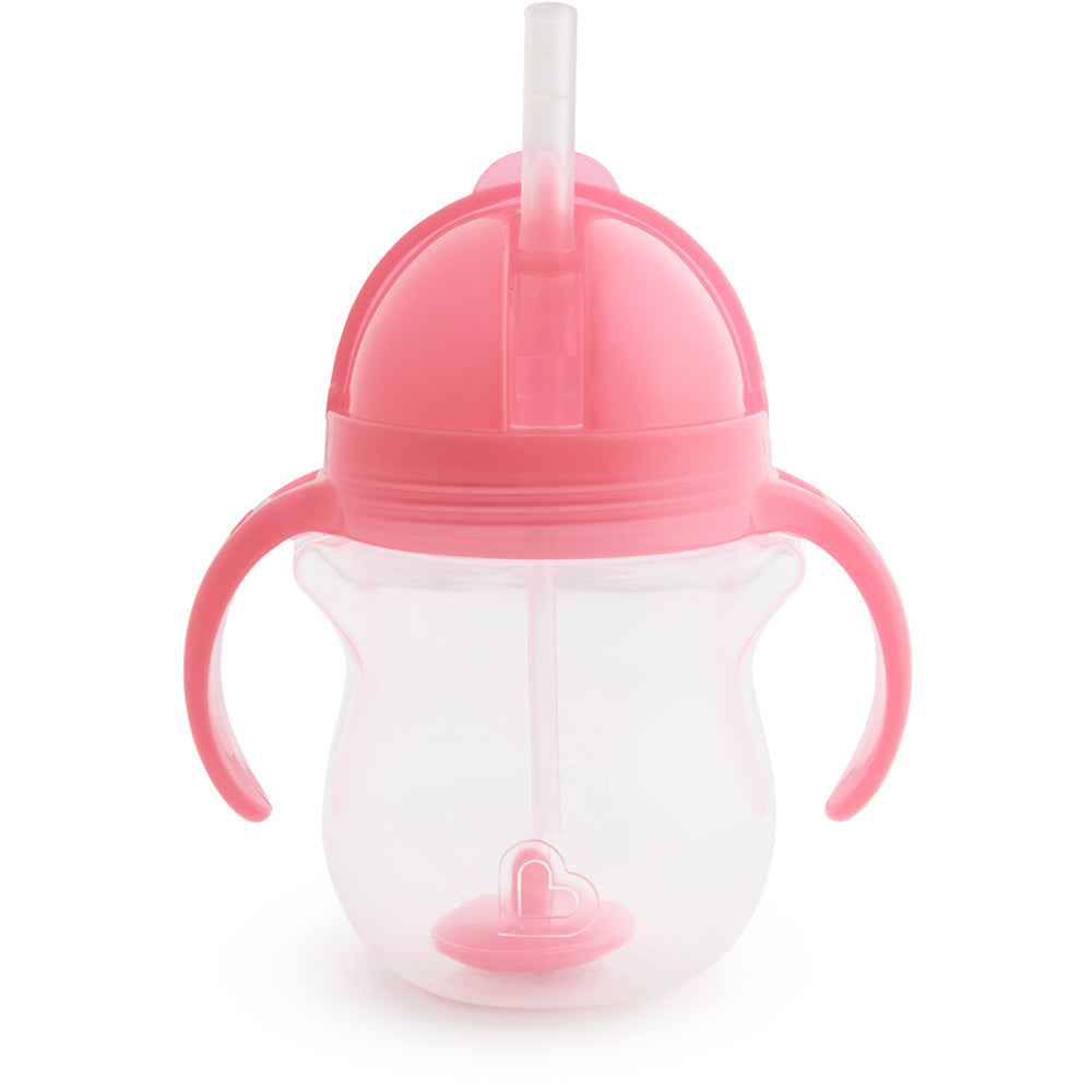 Baby and toddler Munchkin Any Angle Click Lock Weighted Straw Trainer Cup with handles and clear body showing liquid level.