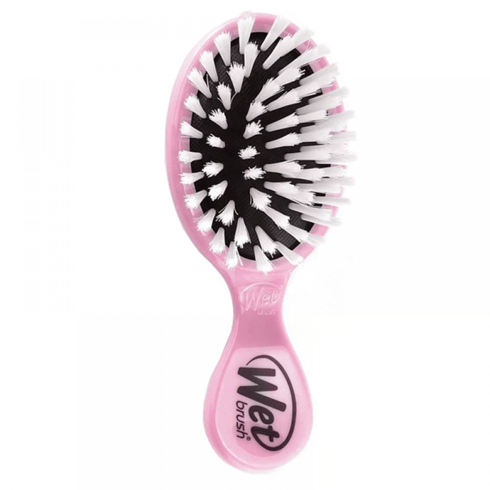 Pink Wet Brush for babies by Pasteur Pharmacy, soft-bristle hairbrush designed for gentle toddler hair detangling.