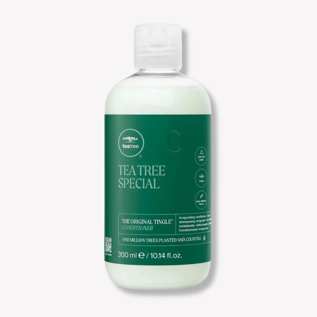 Paul Mitchell Tea Tree Special Conditioner bottle showing green and white packaging with the product label visible.