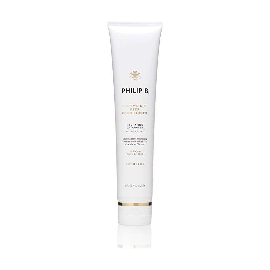 Philip B. lightweight deep conditioning creme rinse in 6 oz bottle, designed to nourish and hydrate hair.