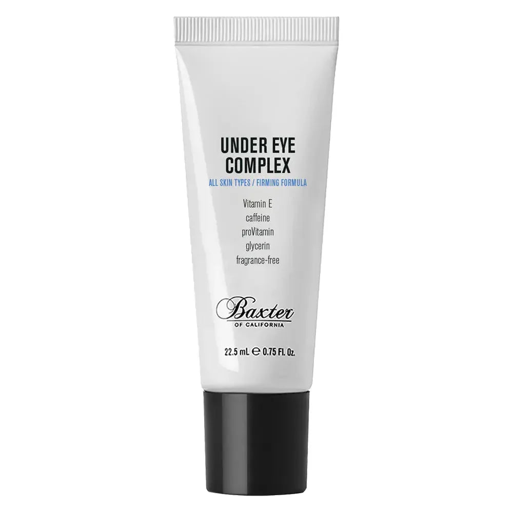 Baxter Under Eye Complex eye cream in a 22.5mL tube, designed to reduce puffiness and dark circles, by Pasteur Pharmacy.