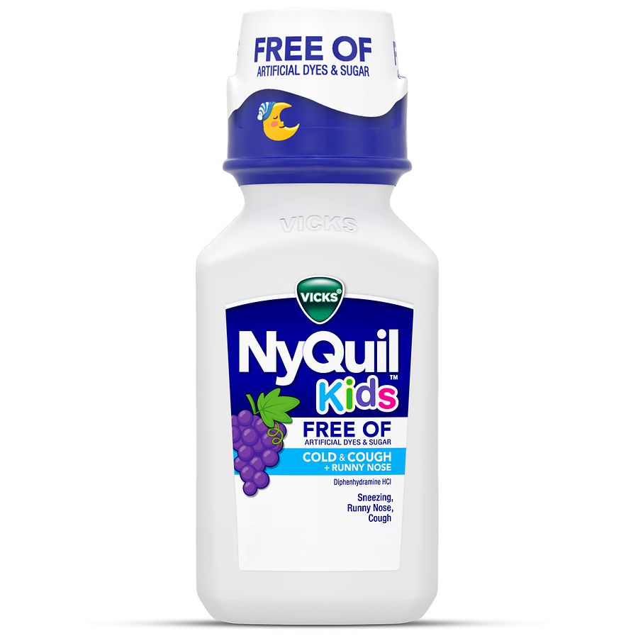 Bottle of Vicks NyQuil Kids Nighttime Honey flavor syrup in front of grapes, highlighting artificial-free formula and kid-friendly packaging.