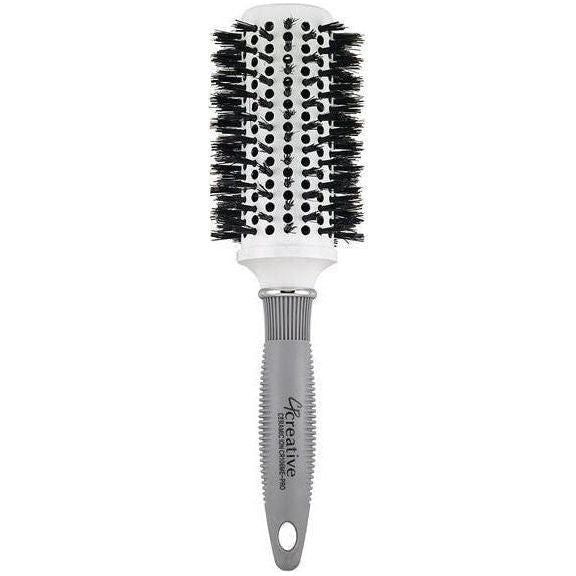 Ceramic vented boar bristle hair brush by Pasteur Pharmacy with ergonomic handle and natural bristles for smooth styling.