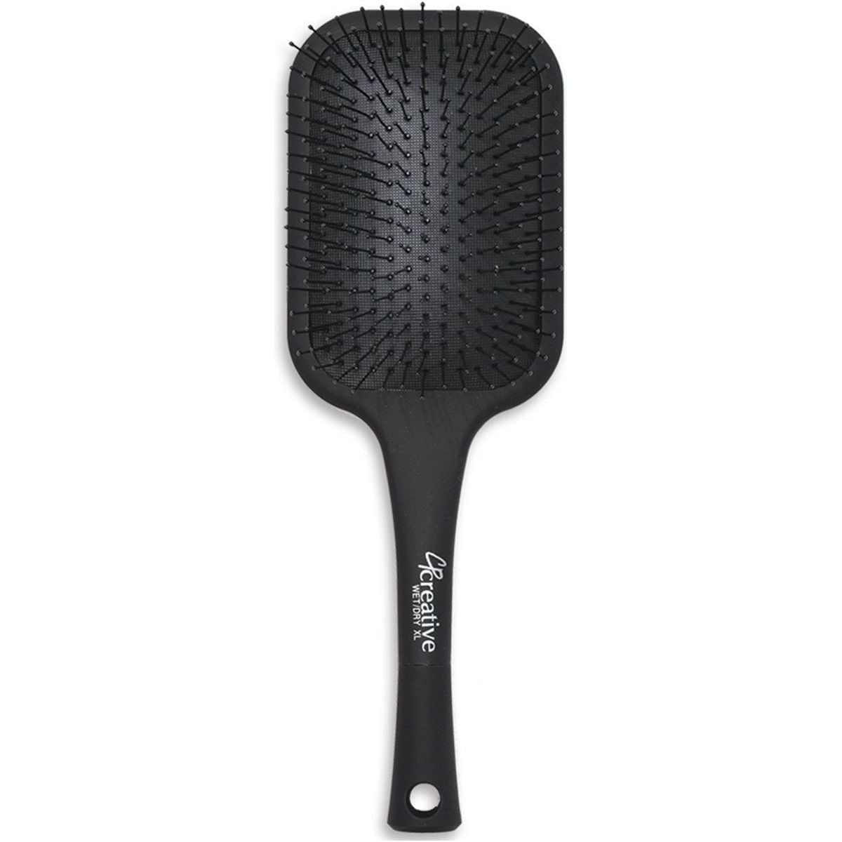 Large detangling paddle hair brush by Pasteur Pharmacy, designed for wet or dry hair, with wide teeth for smooth detangling.