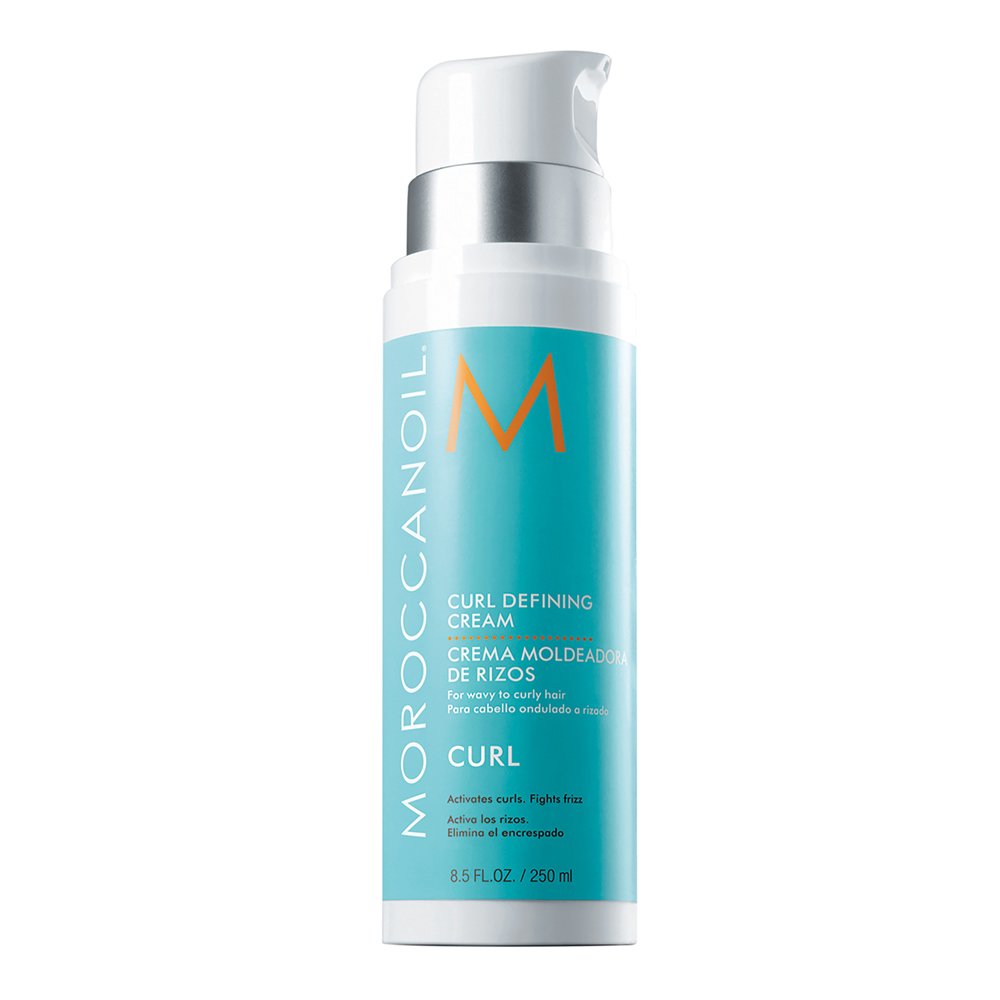 Moroccanoil Curl Defining Cream 250ml for defining and moisturizing curly hair, shown in a clear bottle on a white background.