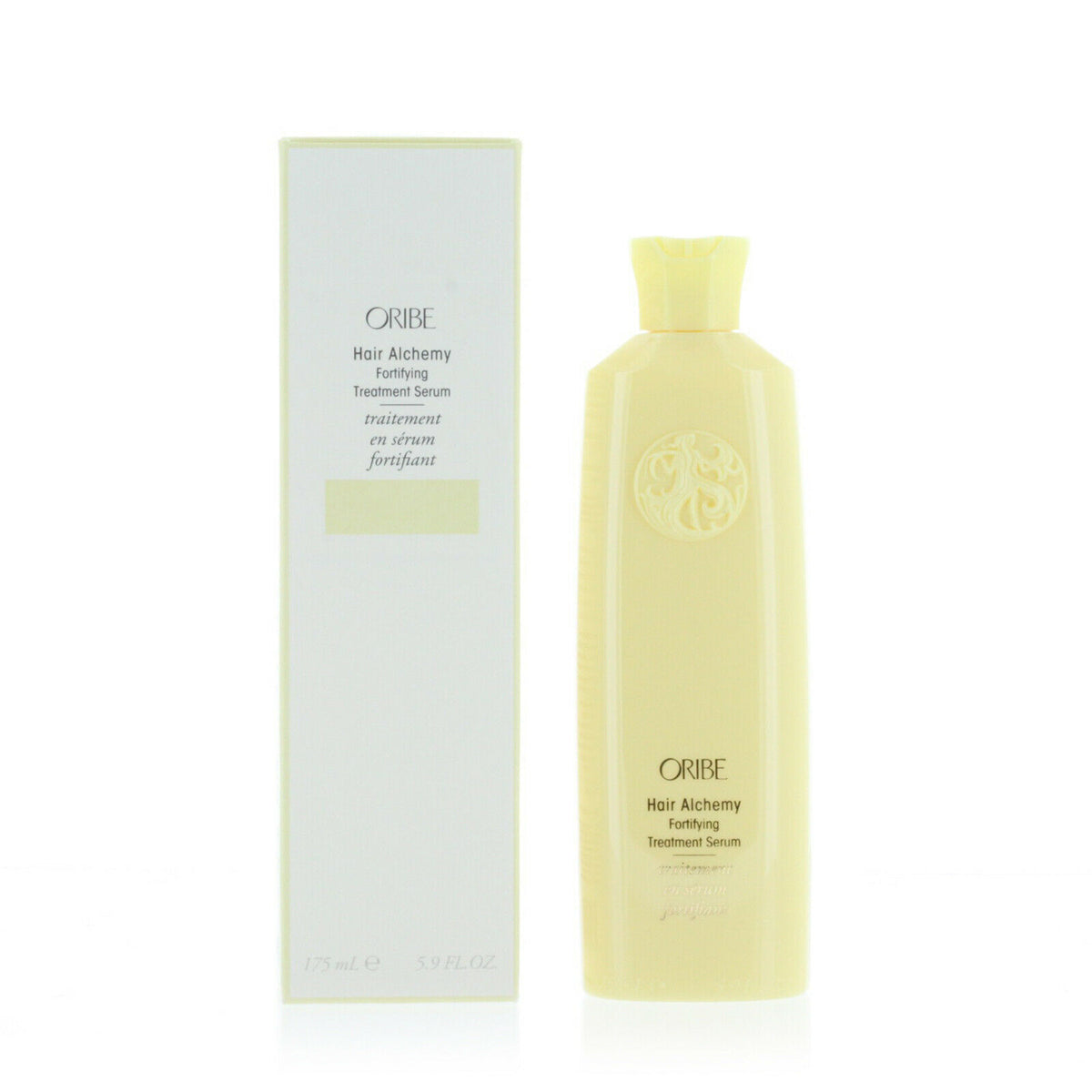 Oribe Hair Alchemy Fortifying Treatment Serum bottle for hair care, with a sleek design and brand label visible.
