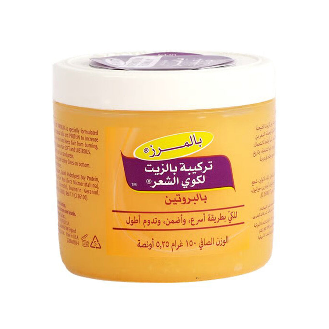 Palmer's Pressing Oil Formula 5.25oz for hair care, natural hair styling oil with a clear bottle and label visible.
