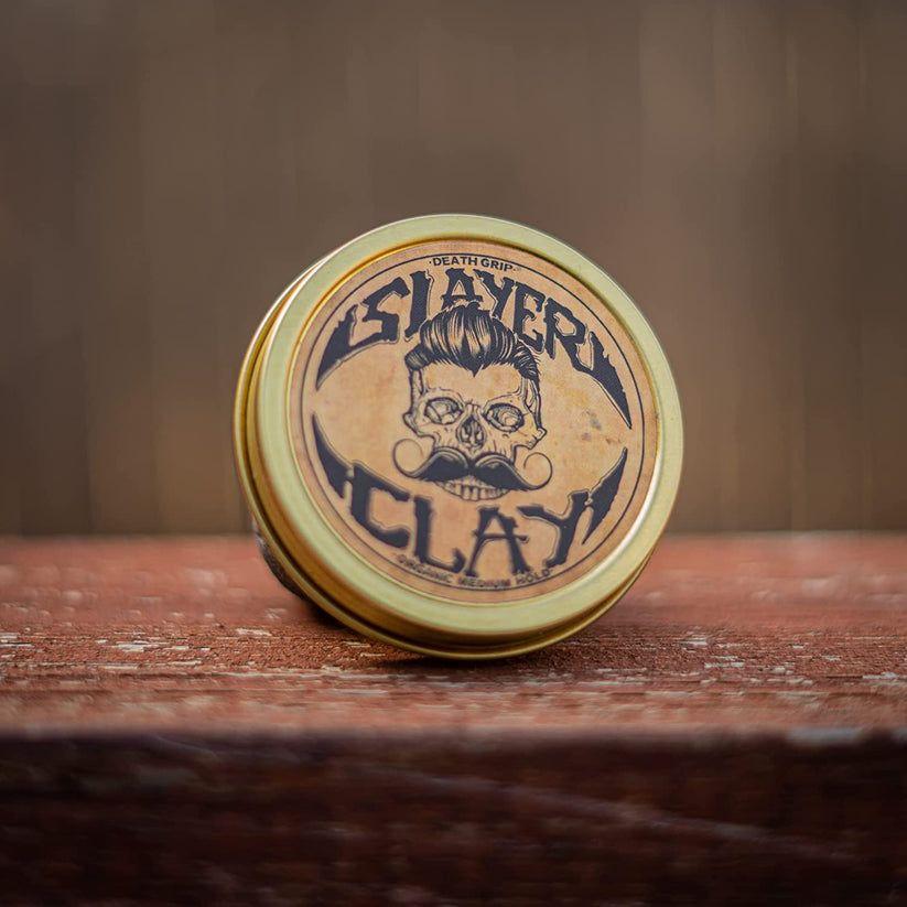 Death Grip Slayer Organic Hair Clay by Pasteur Pharmacy, medium hold styling product in 2 oz jar, ideal for textured hair.