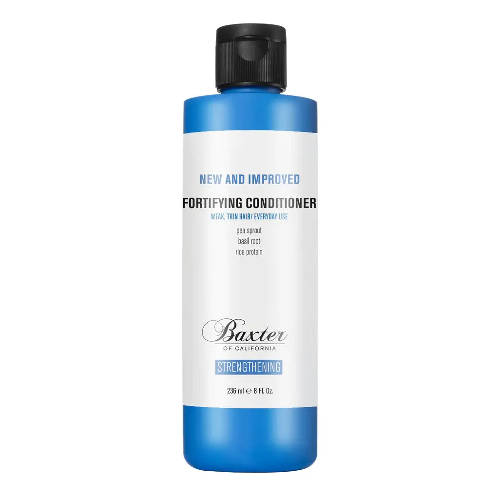 Baxter of California Fortifying Conditioner 8 oz for healthy, strong hair, shown in a sleek bottle on a bathroom shelf