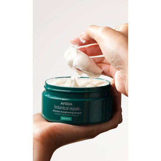 Aveda Botanical Repair Intensive Strengthening Hair Mask in a 6.8oz jar, rich formula for damaged hair care.