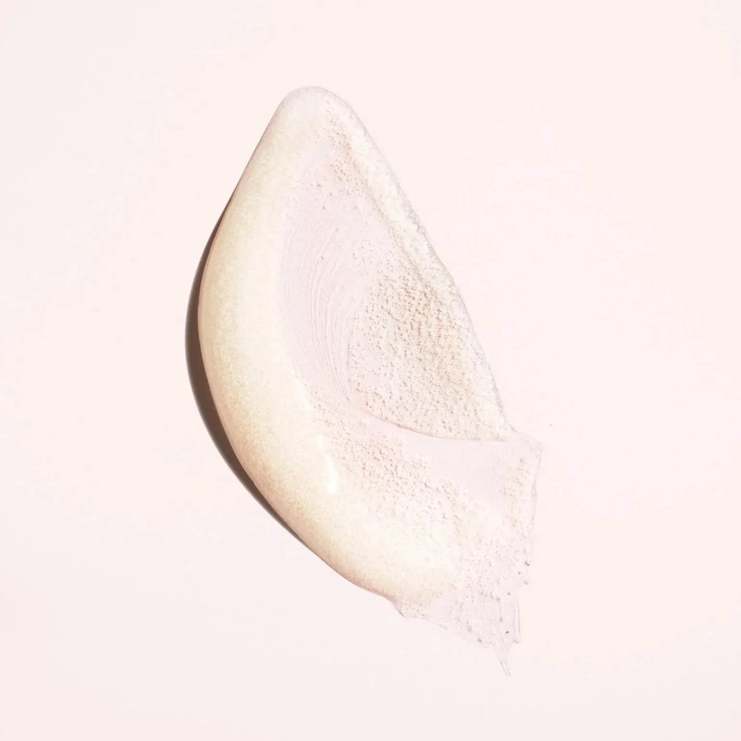 Oribe Serene Scalp Exfoliating Scrub in 125ml jar, showing the white textured scrub product in a clear container with label.