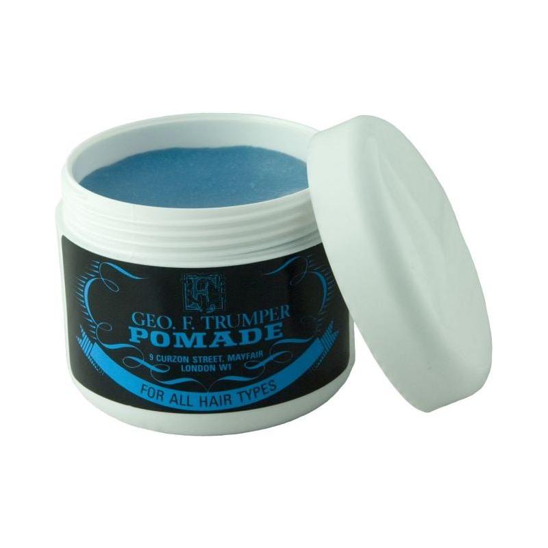 Geo. F. Trumper Blue Pomade Hair Wax 100ml in a jar showing smooth, shiny hair styling with the blue label and branding visible.