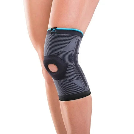 Black DonJoy Advantage Deluxe Elastic Knee Brace in X-Large size, showing adjustable straps and supportive design for knee stabilization.