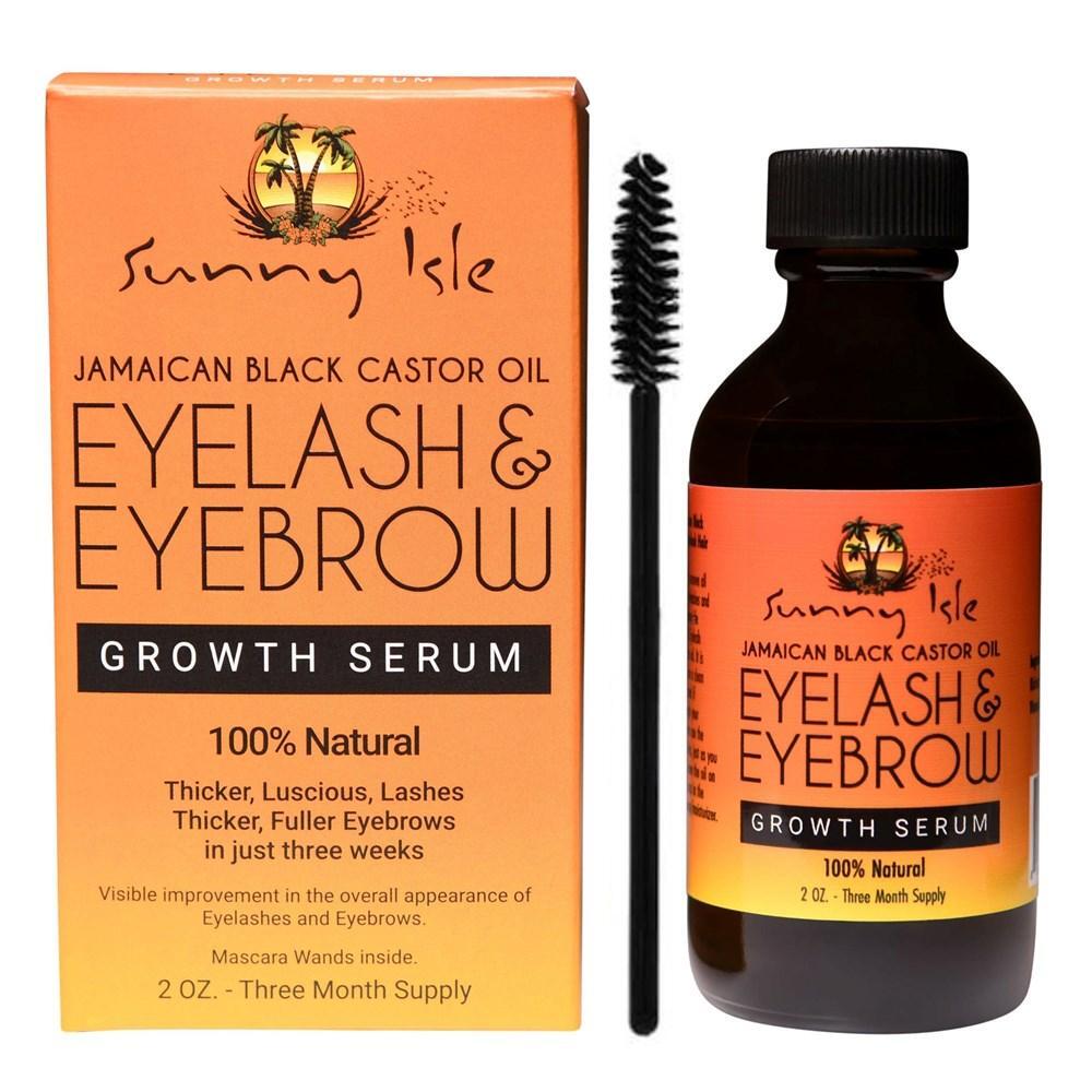 Sunny Isle Jamaican Black Castor Oil Eyelash and Eyebrow Serum in a small bottle, used as a natural makeup product for lash and brow enhancement.