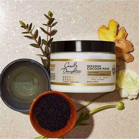 Carol's Daughter Goddess Strength Repairing Cocoon Mask in a 12 oz jar, nourishing hair treatment with natural ingredients.