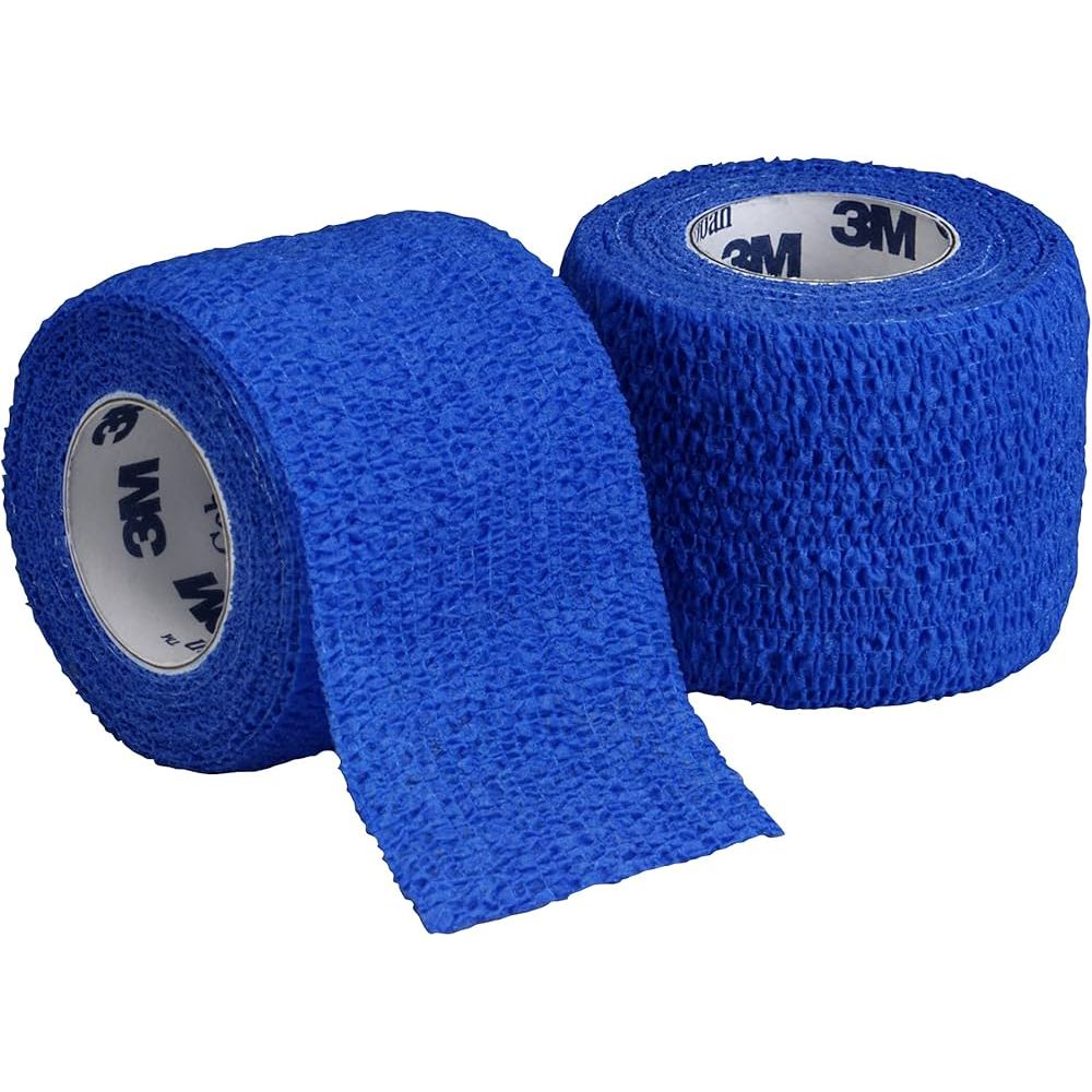 Blue 3M Coban self-adherent wrap, cohesive medical bandage, 2-inch by 5-yard roll, designed for secure wound support.
