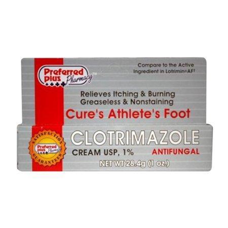 Clotrimazole Preferred Plus antifungal cream 1% in a 1 oz tube, displayed inside a medicine cabinet with pharmacy branding.