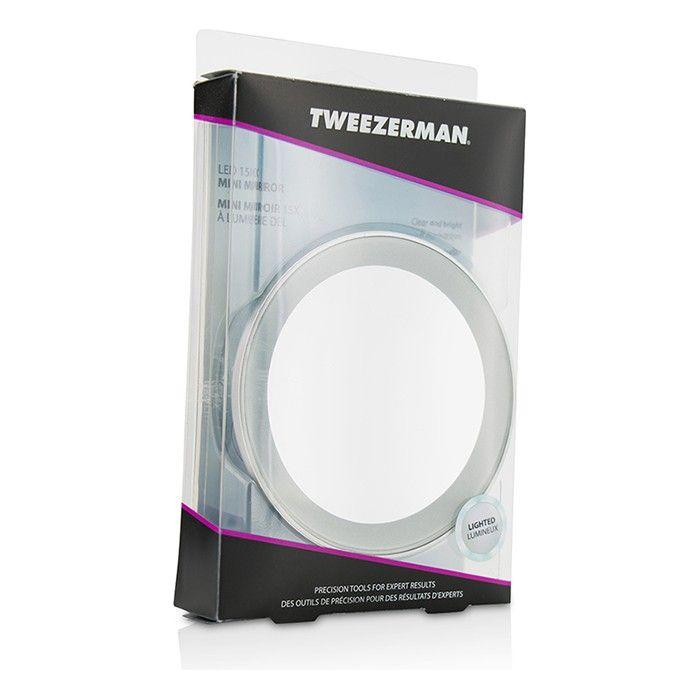 Tweezerman LED 15x Mini Mirror showing a compact, handheld mirror with LED lighting, perfect for close-up grooming.