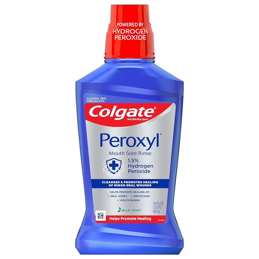 Colgate Peroxyl antiseptic mouthwash in a 16.9 fl oz bottle, mild mint flavor, used for oral sore relief and oral hygiene.