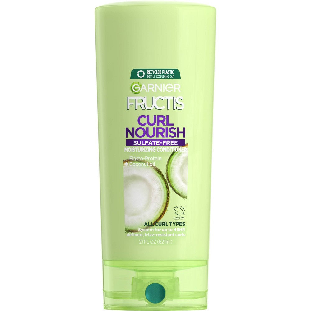 Garnier Fructis Curl Nourish paraben-free conditioner bottle, 21 fl oz, for curly hair, in a white and green bottle.