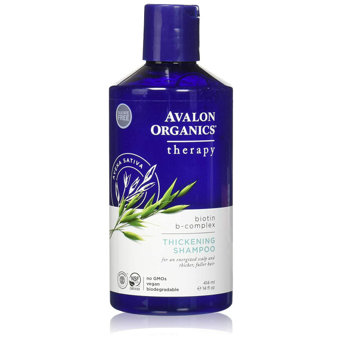 Avalon Organics Thickening Shampoo with Biotin B-Complex in a 14 oz bottle, natural herbal formula for fuller hair.