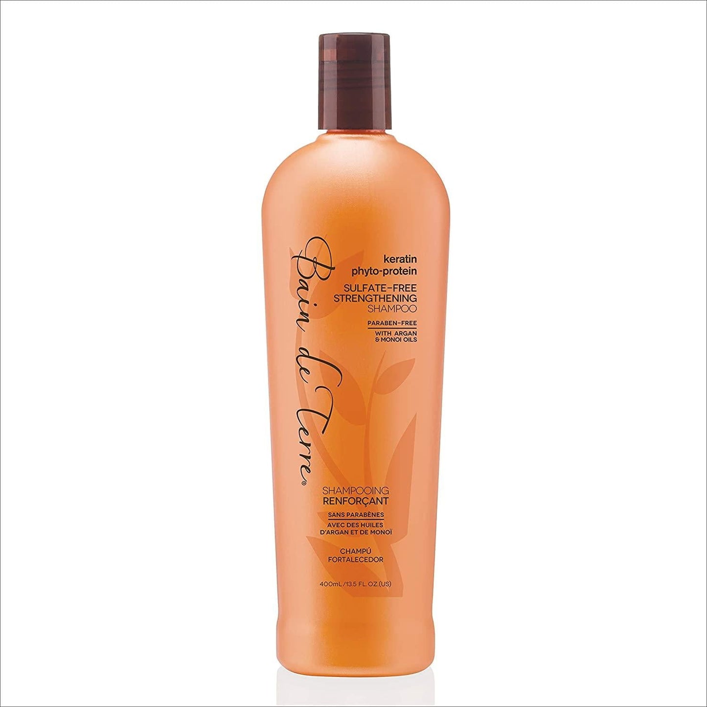 Bain De Terre Keratin Phyto-Protein Strengthening Shampoo in 13.5 oz bottle, formulated to strengthen and restore hair.