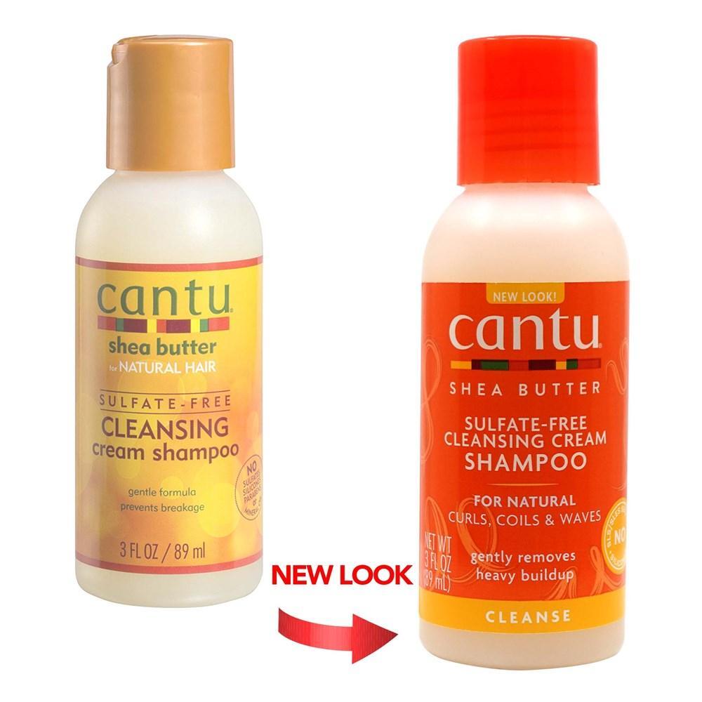 Cantu Shea Butter Shampoo in a clear bottle, featuring a white label with blue and yellow accents, designed for cleansing and moisturizing.