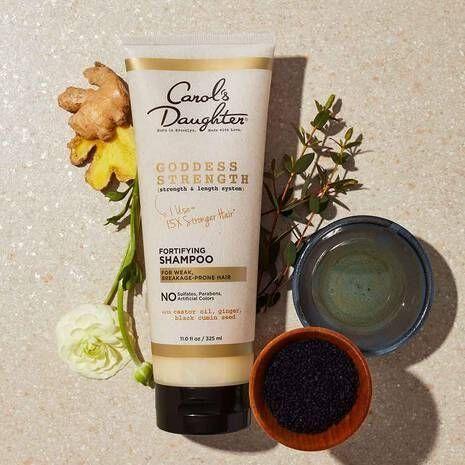 Carol's Daughter Goddess Strength Fortifying Shampoo in 11 fl oz bottle, featuring the shampoo's packaging and branding.
