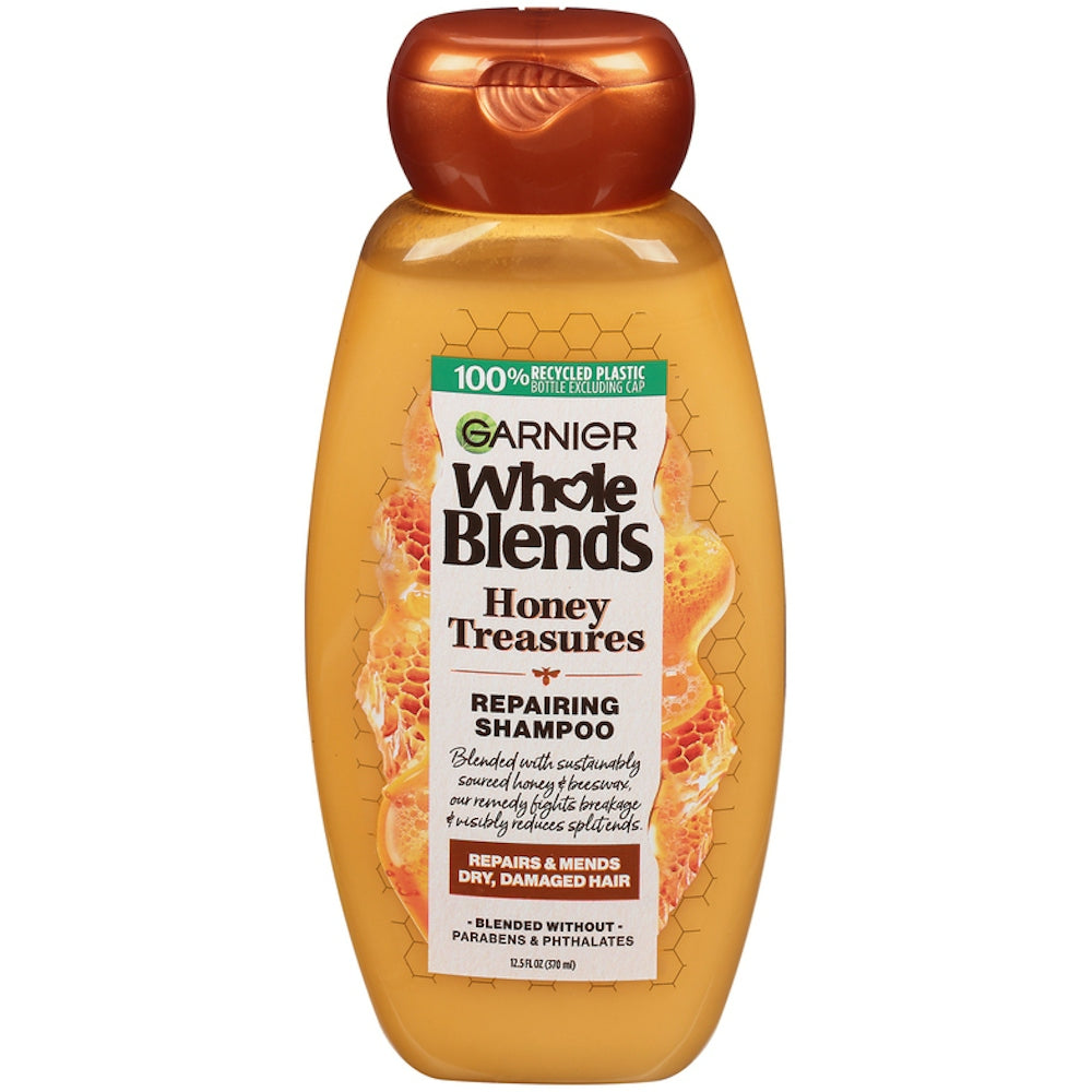 Garnier Whole Blends Repairing Shampoo with honey treasures in 12.5 fl oz bottle, natural hair care product.