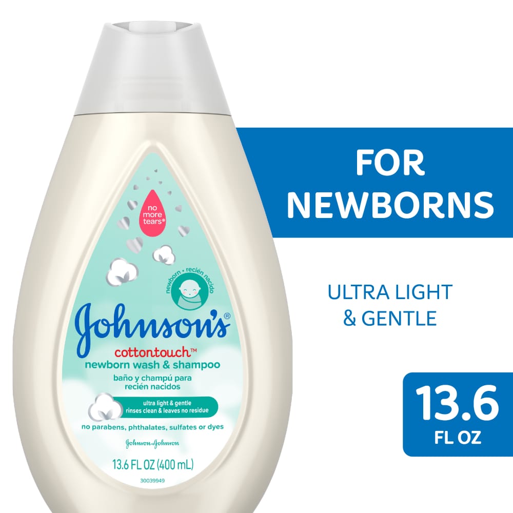 Johnson's Baby CottonTouch newborn body wash and shampoo bottle, 13.6 fl oz, with gentle, tear-free formula for babies.