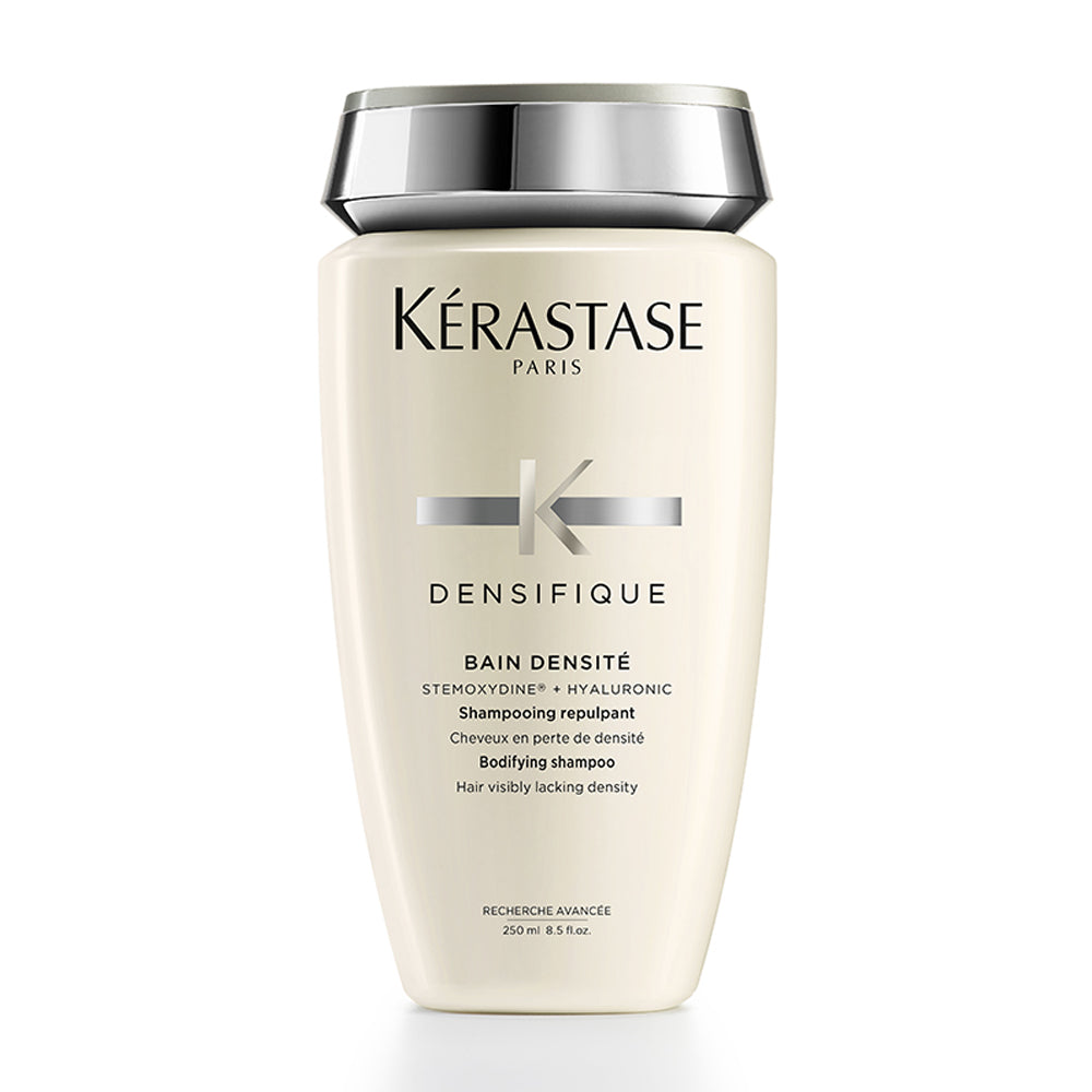Kerastase Densifique Bain Densité shampoo bottle, 250ml, with sleek design and label showing brand and product name.