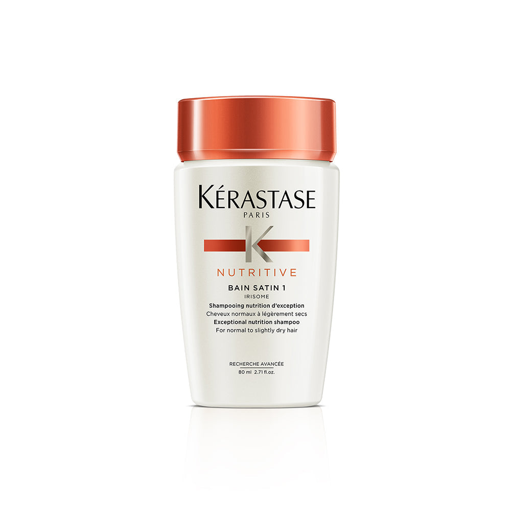 Kerastase Nutritive Bain Satin Shampoo in 250ml bottle, smooth and nourishing hair care product, shown in a clear shampoo bottle.
