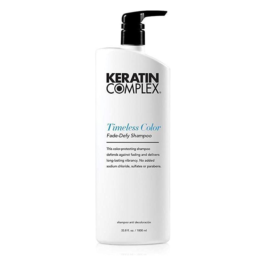 Keratin Complex Color Therapy Timeless Color Fade Defy Shampoo in 33.8 oz bottle, designed to protect and enhance color-treated hair.