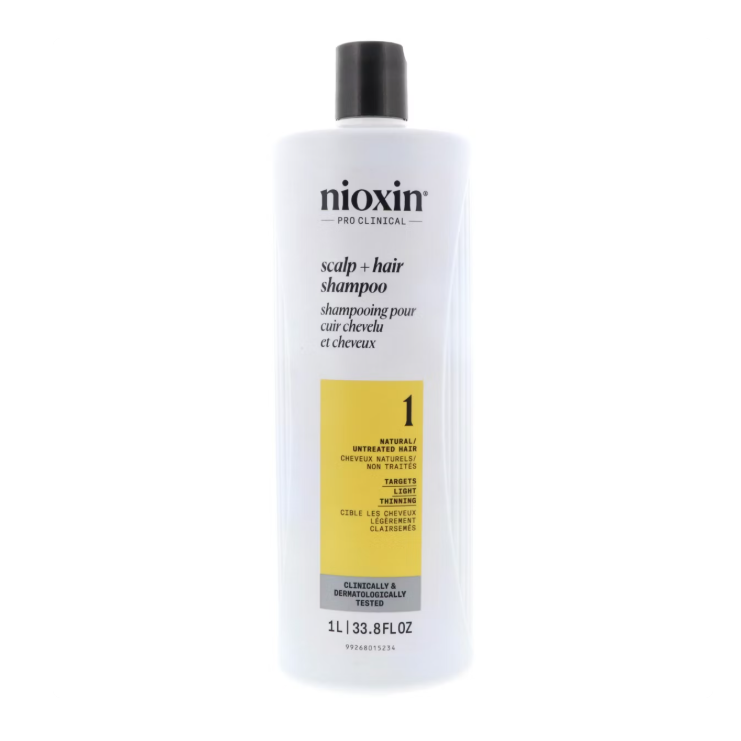 Nioxin System 1 Natural Hair Light Thinning Cleanser Shampoo in 33.8oz bottle, designed for fine, thinning hair.