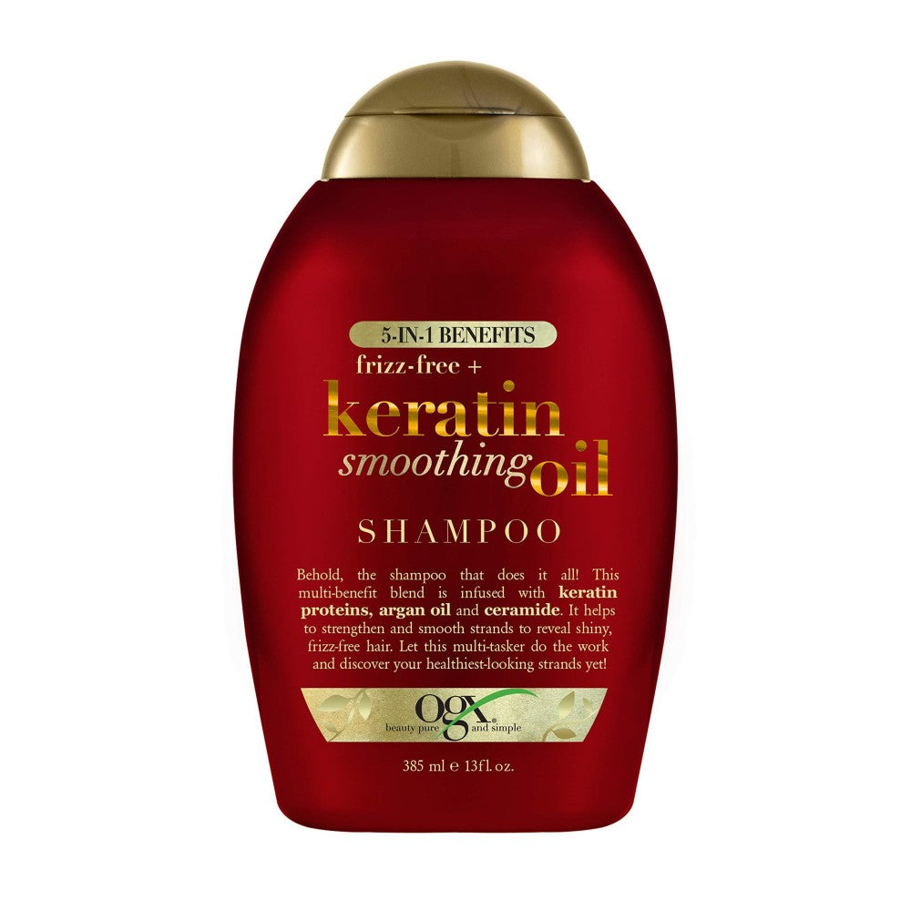 OGX Frizz-Free & Keratin Smoothing 5-in-1 Oil Shampoo bottle from Pasteur Pharmacy, 13 oz, with sleek packaging and label.