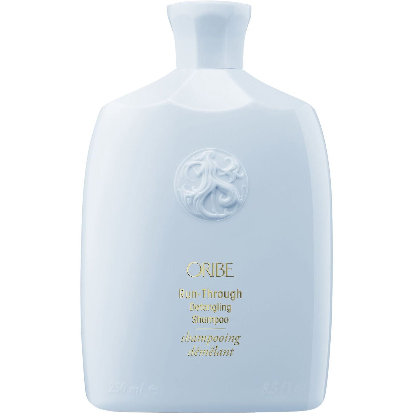 Oribe Run-Through Detangling Shampoo in 8.5 oz bottle, smooths and detangles hair, natural hair care by Pasteur Pharmacy.