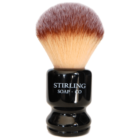 Synthetic Stirling Soap Co. shaving brush with a 26x54 Pro handle, featuring soft bristles and a sleek design.