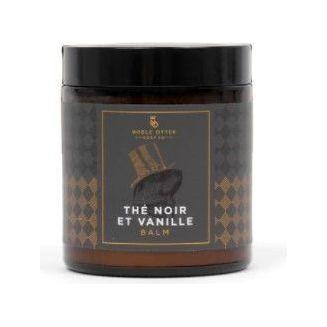 Noble Otter Soap Co. Noir Et Vanille shaving set with soap, brush, and accessories for a luxurious grooming experience.