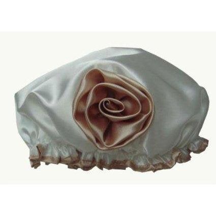 Ivory Elegance Shower Cap by LA Indulgence, made by Pasteur Pharmacy, with soft fabric and waterproof design for hair protection.