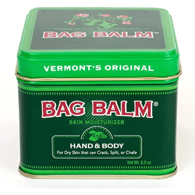 Vermont's Original Bag Balm skin care cream in an 8 oz jar by Pasteur Pharmacy, suitable for soothing dry skin and chapped areas.