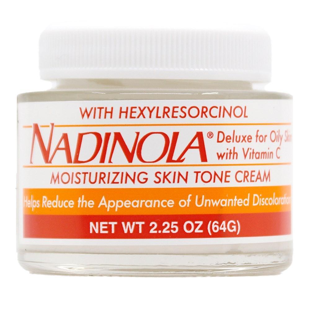 Nadinola Skin Fade Cream Deluxe for oily skin in 2.25 oz jar, with skincare ingredients and smooth cream texture.