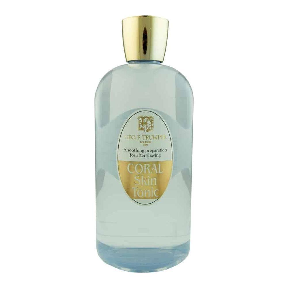 Small coral-colored bottle of Geo F. Trumper Skin Tonic 100ml from Pasteur Pharmacy, featuring a sleek design and label.