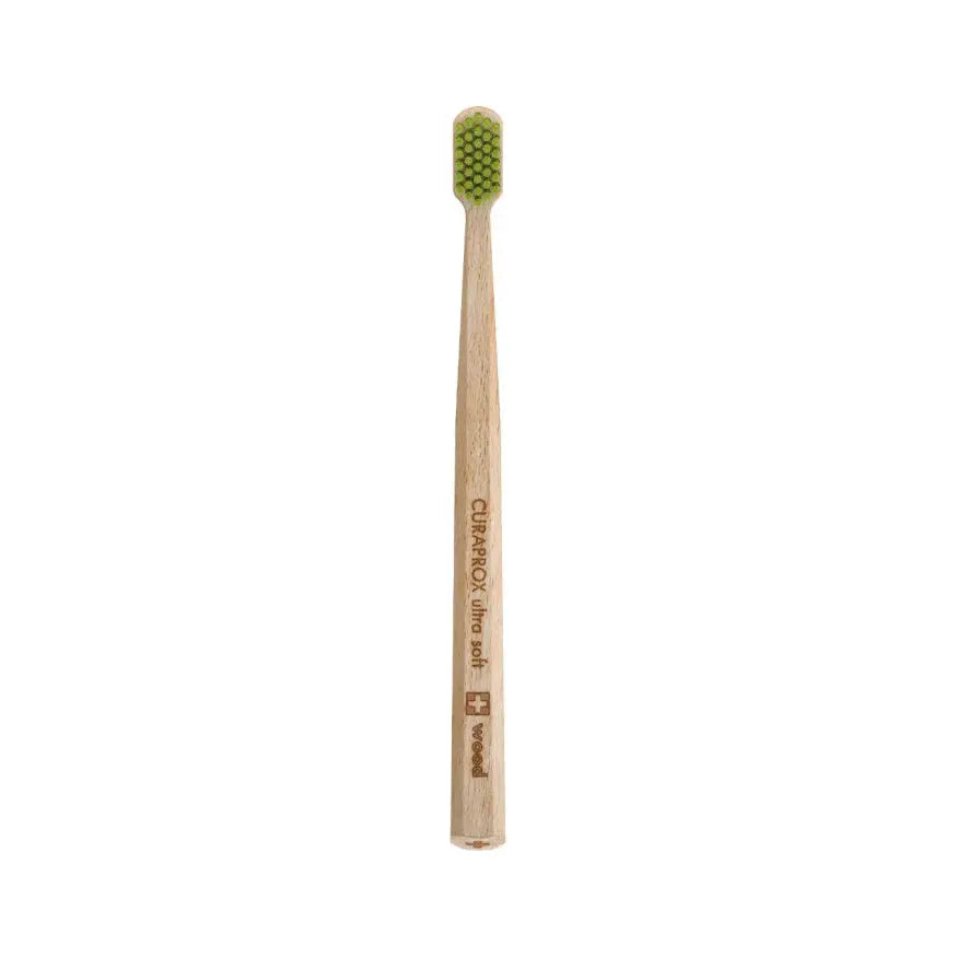 Pasteur Pharmacy 4440 Ultra Soft Wooden Toothbrush showing natural wooden handle and soft bristles for gentle cleaning.